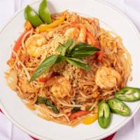 Pad Thai (Any Meat) · Thin flat rice noodle stir fried with meat, bean sprout, scallion, peanut in the Thai specia...