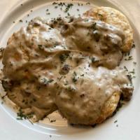 Southern Style Biscuits & Sausage Gravy · Made from scratch, buttermilk biscuits served with pork sausage gravy.