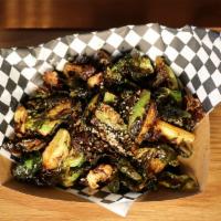 Crispy Garlic Brussel Sprouts · Deep-fried Brussel sprouts served with soy ginger dressing.