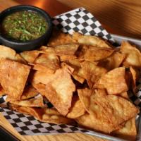 Fresh Chips And Smoked Salsa · Freshly fried corn tortillas served with smoked Tomatillo and tomato salsa.