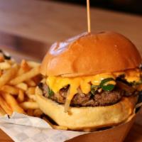 High Proof Burger · Half pound of ground beef with grilled onions jalapenos spicy mayo and cheddar cheese on a b...