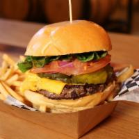 Classic Burger · 1⁄2 pound patty on a brioche bun with American cheese, lettuce, tomato, red onion, pickles, ...