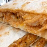 Quesadilla Grande · Flour tortilla stuffed with cheese meat of your choice and sliced in four.
