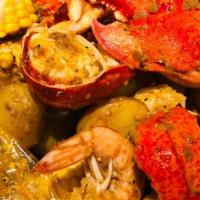 Seafood Comb B · Include 1 piece lobster tail, 1/2 lb scallop, and 1/2 lb gulf shrimp. Served with egg, corn,...