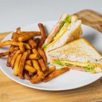 Signature Chicken Club  · Pulled Chicken, Eggs, Cheese, Lettuce, Tomato, Mayo and Sandwich bread