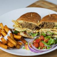 Chicken Shami Kebab Burger · Ande Wala Burger / Bun Kebab Style 
Ground meat layered on the bread with egg.