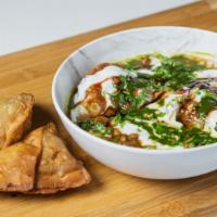 Samosa Chaat · Fried or baked pastry with a spicy potato filling, Dipped in Tamarind and Spicy Yogurt sauce...