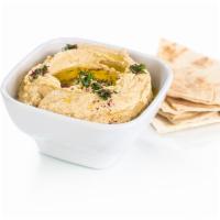 Hummus · Vegetarian. Our homemade blend of garbanzo beans and spices.