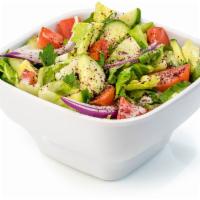 Side House Salad · Our house salad with our simply Mediterranean dressing.