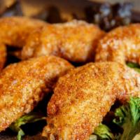 Fried Chicken Wings · Black peppered fried chicken wings, sweet soy sauce.
