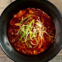 Spicy Beef Soup · Slow-cooked pulled beef, tofu, bean sprouts, scallions.