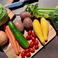 Community Veggie Box · This box includes: 4 potatoes, 1 onion, 1 pack of grape tomatoes, 2 broccoli crowns, 2 zucch...