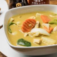 C3 Yellow Curry · Spicy. Yellow curry with bell peppers, potatoes, carrots, onions, served with white rice.