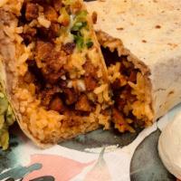 Burrito · Los Tres Amigo Taqueria favorite: Flour tortilla stuffed with meat of choice, beans, rice, l...