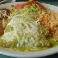 Enchiladas · Inside: meat of choice, four rolled corn tortilla topped with red or green sauce mozzarella ...