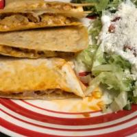 Quesadilla · Inside: meat of choice, flour tortilla filled with mix cheese served with lettuce, dice toma...