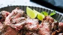 Carne Asada · Thinly sliced grilled beef cook with onions. Served with rice & beans and salad.
