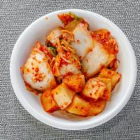 Kimchi · Korean traditional fermented  nappa cabbage with red hot pepper and lots of ingredients.