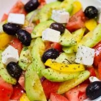 Greek Salad · tomatoes,cucumbers,onion, feta cheese,olives,Greek oregano and olive oil