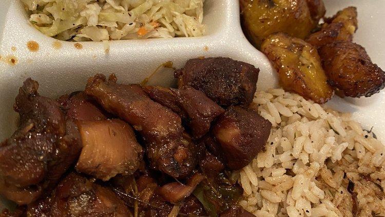 Momma Luvs Caribbean Stew Chicken · Boneless thigh meat tossed in a traditional Caribbean brown stew. Served with coconut rice, & beans, cabbage, & plantains.
