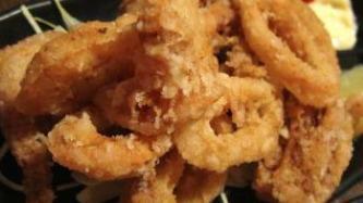 Calamari Karaage · Japanese fried calamari with ponzu sauce, green onion, grated daikon radish and yuzu kosho p...