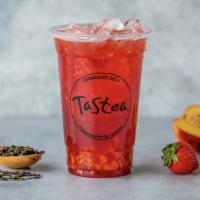 Peach Me Sweetea · Peach strawberry black tea with bits of both.