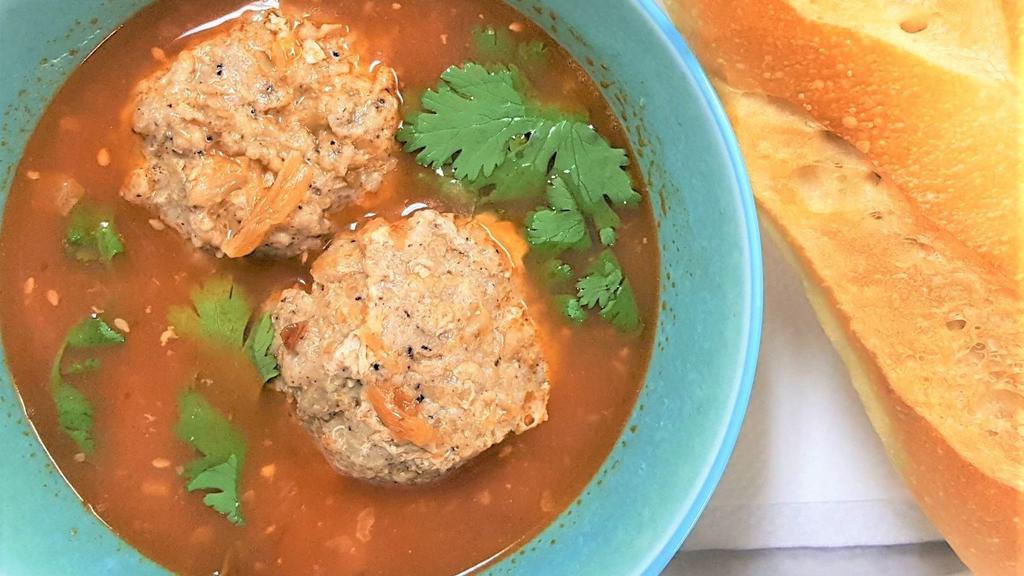 Pork Meatball Soup With Bread · Comes with bread. Vietnamese marinated pork meatballs in tomato soup base. Served with bread.