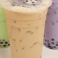 Lychee Milk Tea · Non-dairy creamer, lychee flavor, green tea and sweetener.