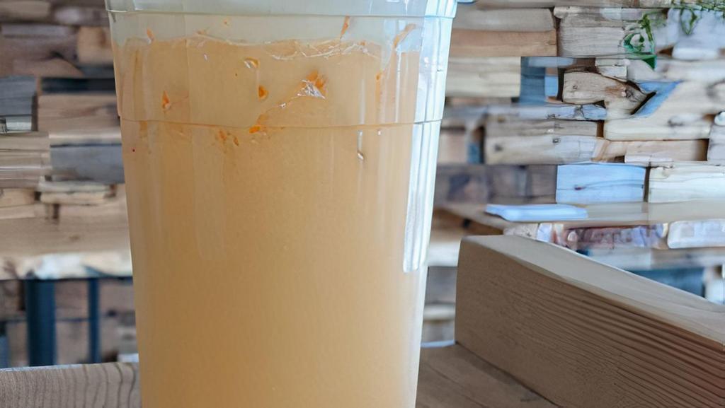 Blended Mango Milk Tea · Mango powder, non-dairy creamer, green tea, sweetened with syrup.