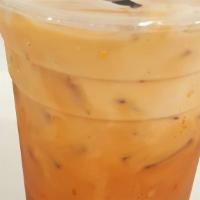 Thai Ice Tea · Loose leaves brew thai tea, half n half creamer and sweetener.