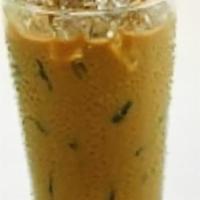 Vietnamese Ice Coffee · Slow dripped blends of coffee, sweetened with condense milk and serve over ice. This is a mu...