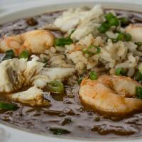 Mia Gumbo · Louisiana-style with shrimp, crab, and okra, served with white rice and saltines.