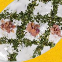 Masto-Khiyar (ماست خیار) · Plain yogurt, chopped Persian cucumbers, and fresh chopped herbs