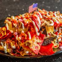 Welded Nachos · Favorite. Our famous house-made red, white and blue tortilla chips smothered with BBQ pulled...