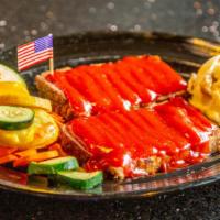 Legendary Meatloaf · Favorite. Home-style meatloaf made in-house with ground beef, pork, carrots, celery, onion, ...