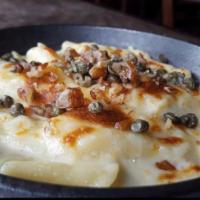 Mac & Cheese · seasonal artisan cheese + traditional béchamel +
campanelle pasta + seasonal accompaniments