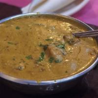Chicken Tikka Masala · Pieces of chicken breast cooked in a tomato-based sauce with fresh Indian herbs and served w...
