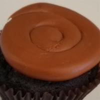 Caramel Chocolate · a chocolate cake topped with a caramel buttercream frosting