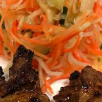 Beef Teriyaki · Gluten-Free. Six pieces Marinated beef flank steak on a stick, served with pickle salad.