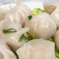 Shrimp Dumpling · Gluten-Free. Eight pieces. Steam only. Marinated shrimp wrapped with clear tapioca flour.