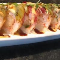Fire Bird · Served with shrimp tempura, daikon sprouts, spicy sauce with soy paper wrap on top with kiwi...