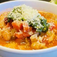 Tuscan White Bean Soup · garden veggies, chicken broth,greens