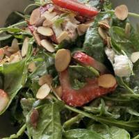 Strawberry, Spinach & Arugula Salad · goat cheese, toasted almonds, pickled onion, lemon dressing