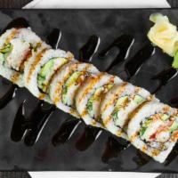 Dynamite Roll (6Pcs) · Shrimp tempura, crab salad, cucumber avocado and eel sauce, masago on top.