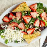 Strawberry Salad · Mixed greens, sliced almonds, feta cheese, garlic toast points, white balsamic dressing.