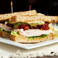 Roasted Turkey · House roasted, hand carved turkey breast, bacon, avocado, chipotle mayo, wheat berry bread.