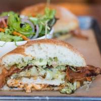 Chimichurri Grilled Chicken Sandwich · caramelized onions, guacamole, pepper jack cheese, smoked tomato aioli, shaved lettuce, baco...