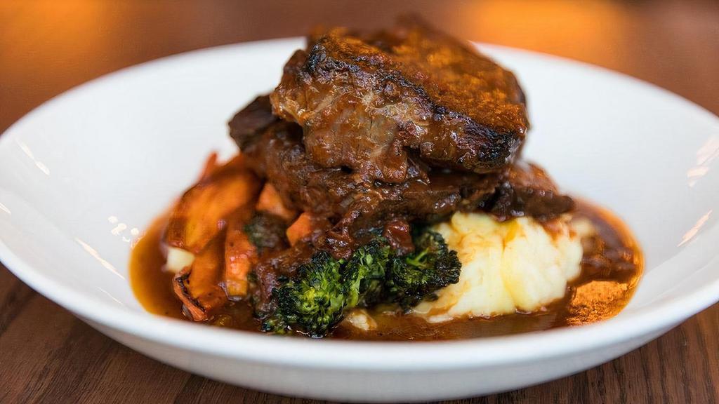 Slow Braised Beef Short Rib · Wood fired vegetables, mashed potatoes and pan gravy