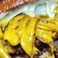 Patty Melt · 6oz. burger topped with Swiss, cheddar, sautéed onions served on grilled NY rye bread