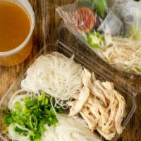 Chicken Pho (Phở Gà) · Traditional Vietnamese soup made with a rich beef broth, tender rice noodles, and choice of ...